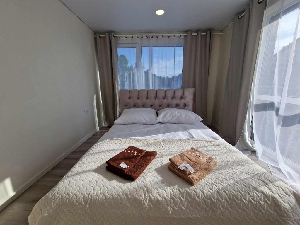 Кровать или кровати в номере 2rest