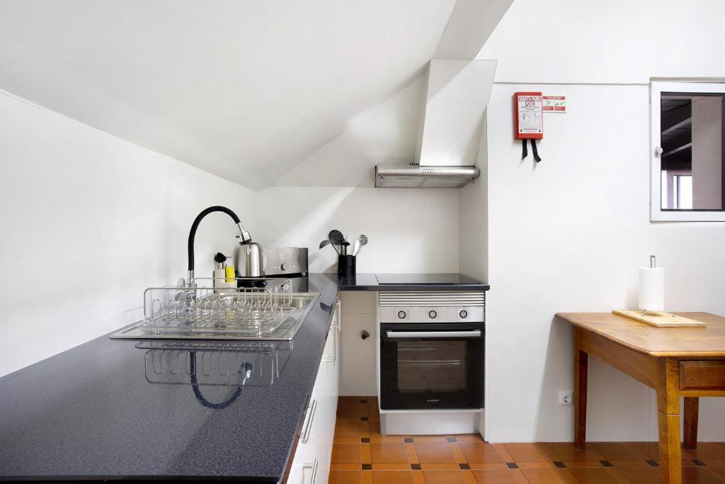 Kuchyň nebo kuchyňský kout v ubytování Penthouse Vista Mar