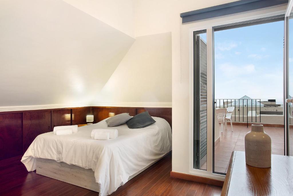 Postel nebo postele na pokoji v ubytování Penthouse Vista Mar