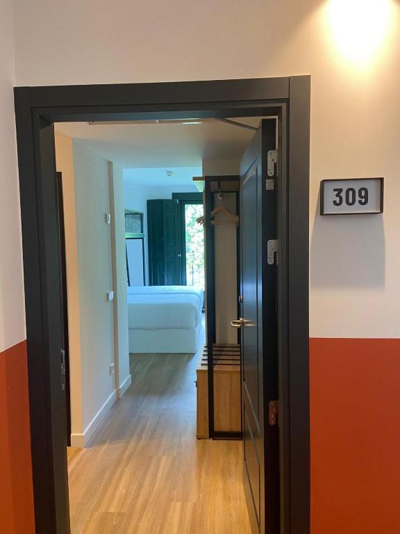 Postel nebo postele na pokoji v ubytování LATROUPE Prado Hostel