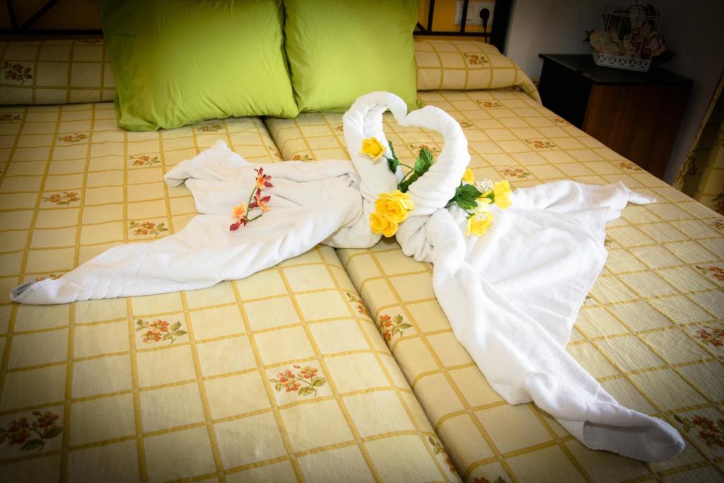 Posteľ alebo postele v izbe v ubytovaní Hostal Malia