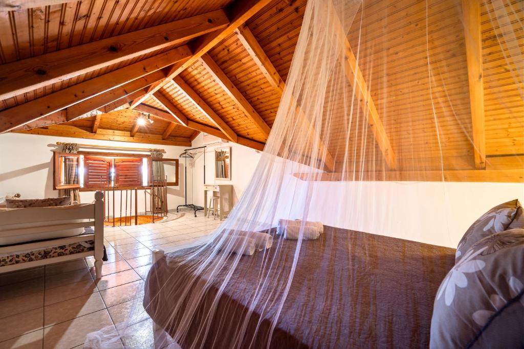A bed or beds in a room at Marketos maisonette 4pax