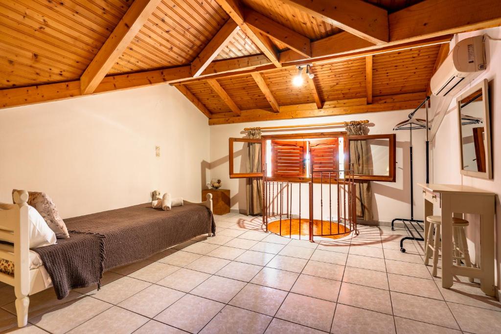 A bed or beds in a room at Marketos maisonette 4pax