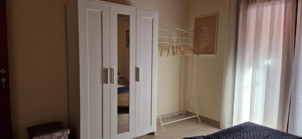 A bed or beds in a room at Grace dell'isola dei Coralli