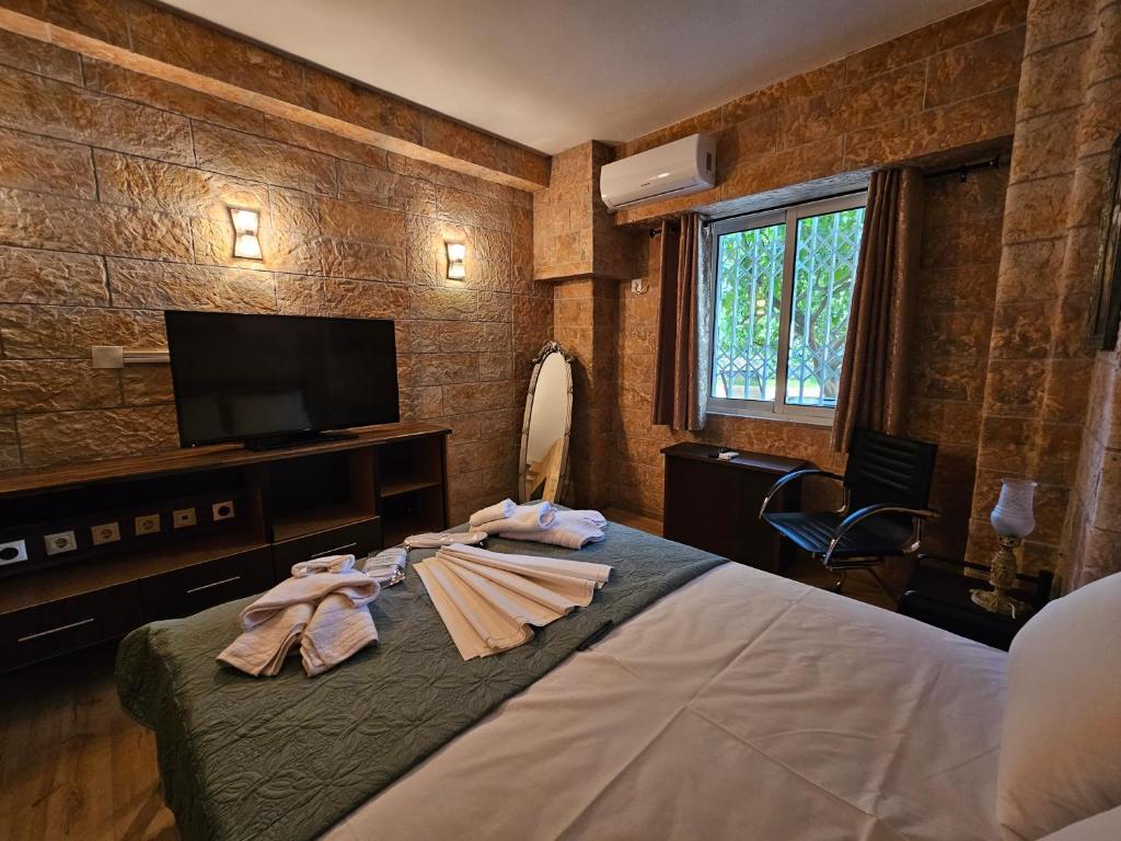 Postel nebo postele na pokoji v ubytování Honeywell Inn
