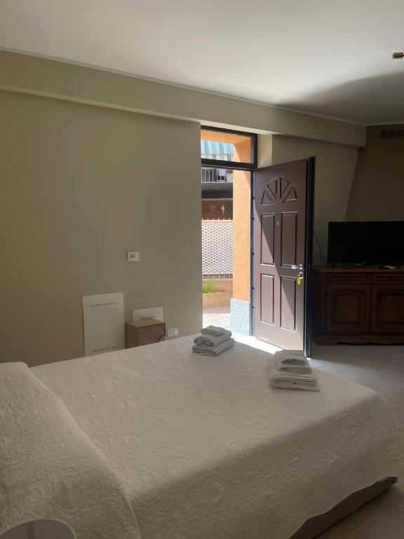 Postel nebo postele na pokoji v ubytování B&B Licia Home