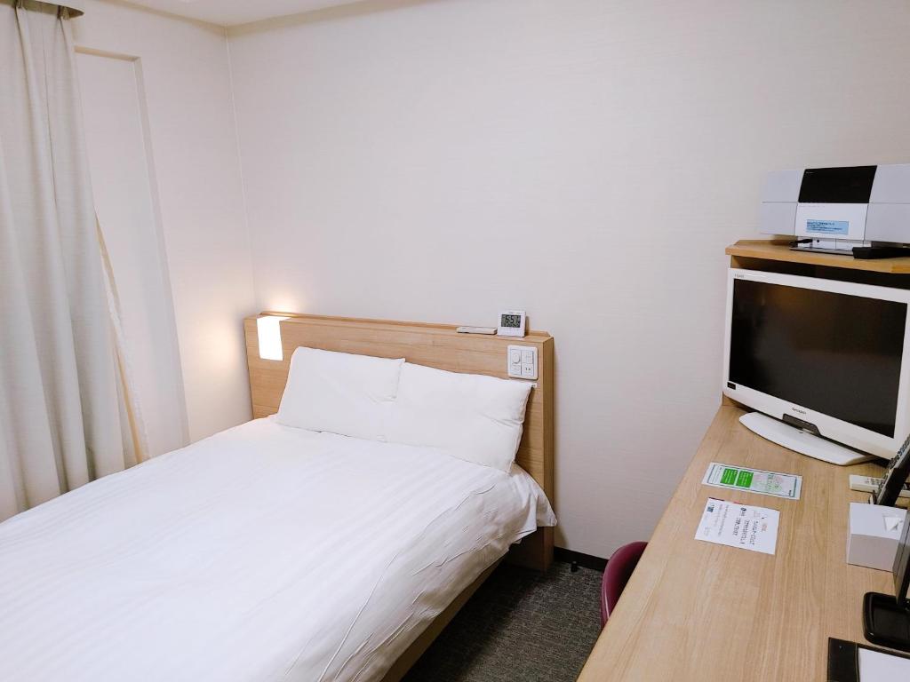 TV a/nebo společenská místnost v ubytování Dormy Inn Express Matsue