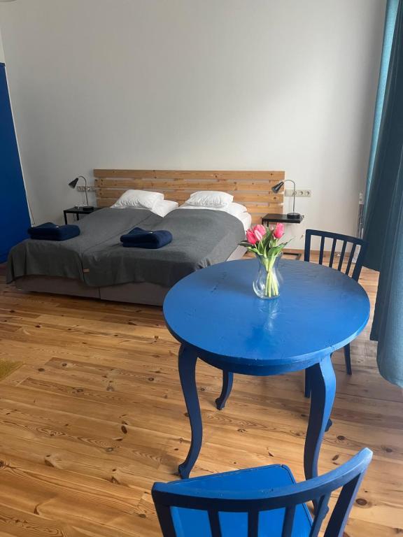 Postel nebo postele na pokoji v ubytování Várkerület 6 Apartman