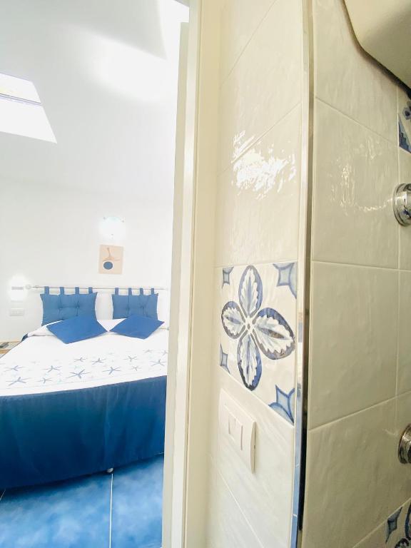 Postel nebo postele na pokoji v ubytování Casa Leo