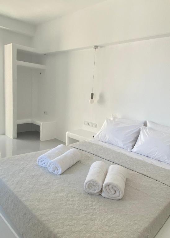 Postel nebo postele na pokoji v ubytování 31 Seafront Apartment