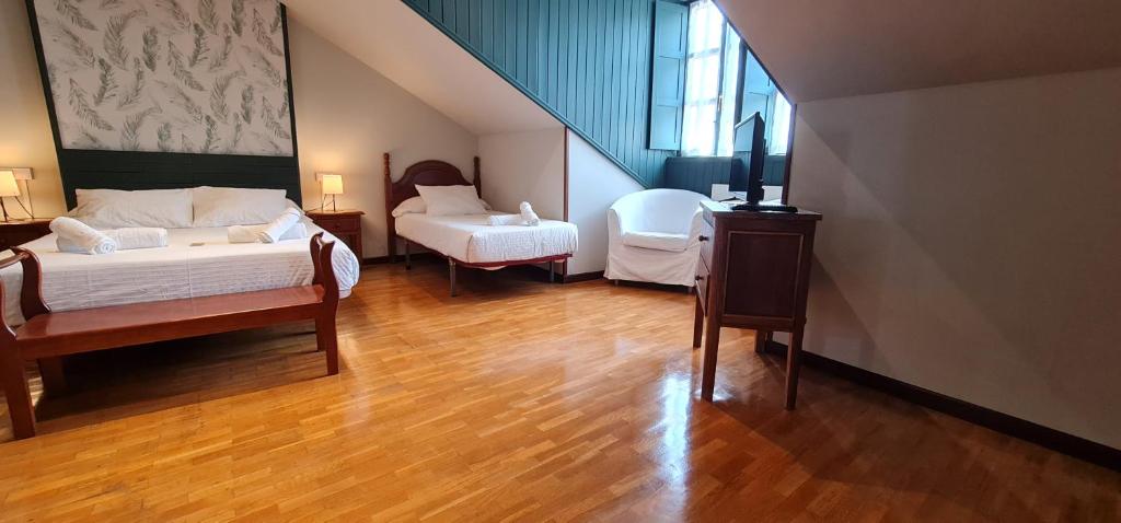 Postel nebo postele na pokoji v ubytování Casa de Aldea Las 7 gotas