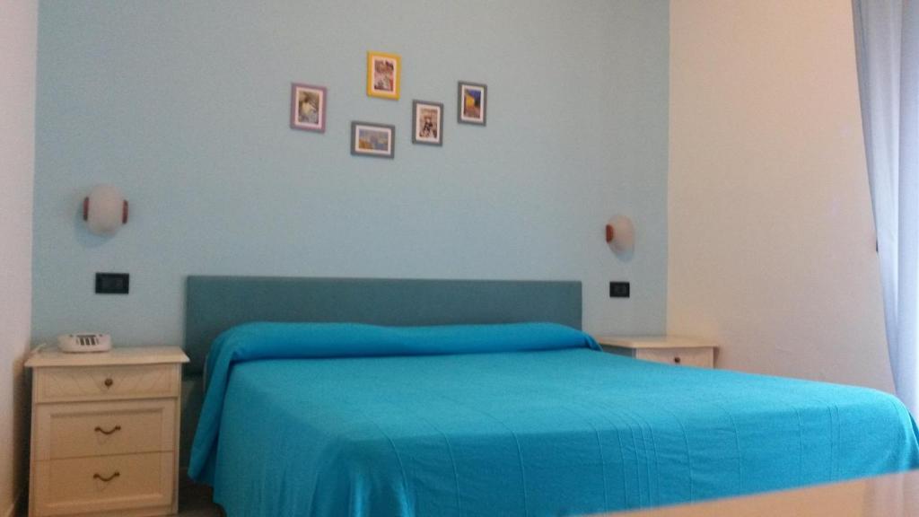 Postel nebo postele na pokoji v ubytování Hotel Costa Citara