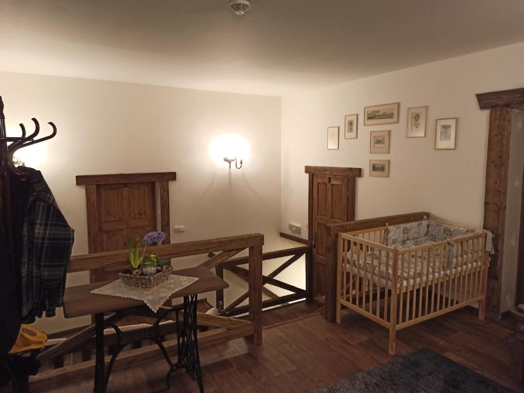 Postel nebo postele na pokoji v ubytování Hospůdka Na Trucovně