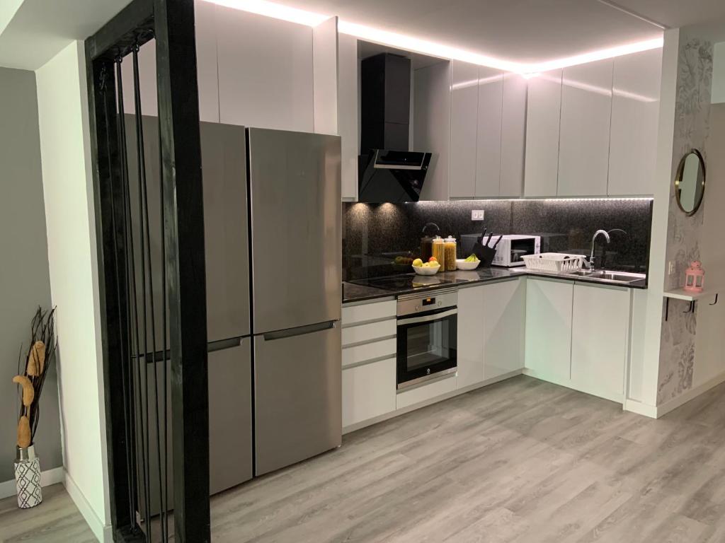 Kuchyň nebo kuchyňský kout v ubytování CoLiving El Toro