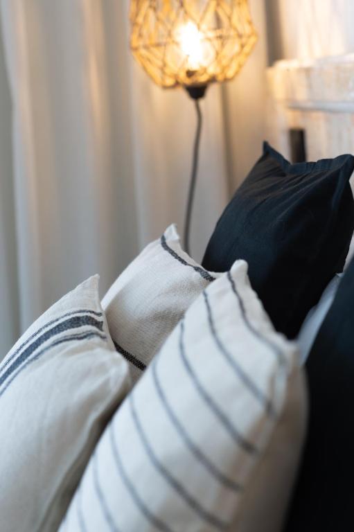 Postel nebo postele na pokoji v ubytování Hostal Boutique Es Menut