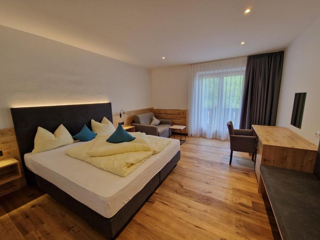 Voodi või voodid majutusasutuse Hotel Mignon toas