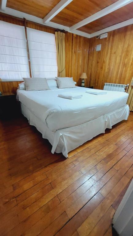 Postel nebo postele na pokoji v ubytování Hotel y Cabañas Llanuras de Diana - Caja Los Andes