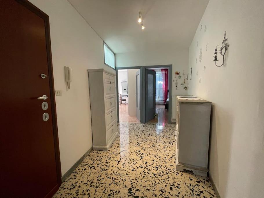a hallway with a room with a tile floor at appartamento velletri centro in Velletri
