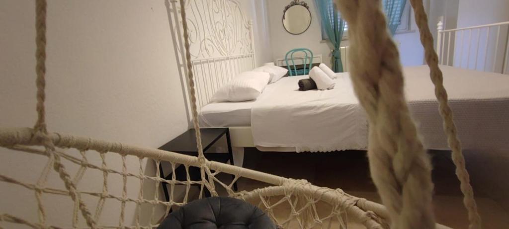 Posteľ alebo postele v izbe v ubytovaní Apartments Mony