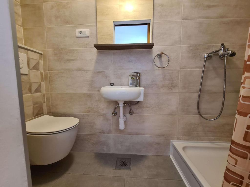 Kúpeľňa v ubytovaní Apartments Vinea