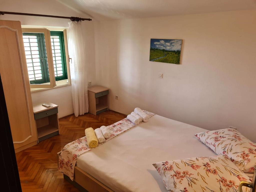 Posteľ alebo postele v izbe v ubytovaní Apartments Vinea