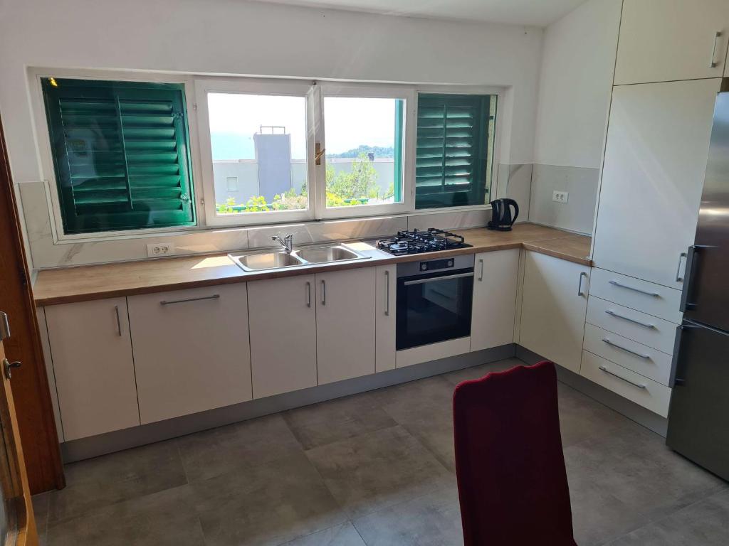 Kuchyňa alebo kuchynka v ubytovaní Apartments Vinea