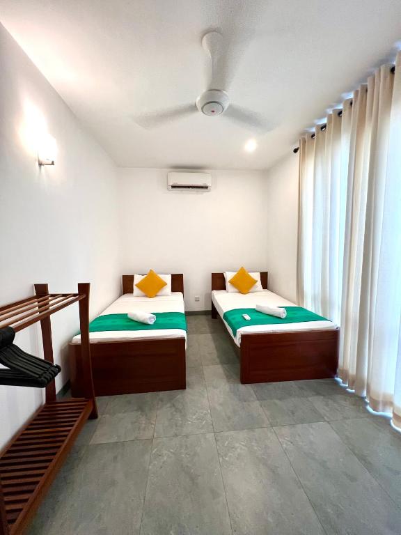 Postel nebo postele na pokoji v ubytování VIBE Hostels