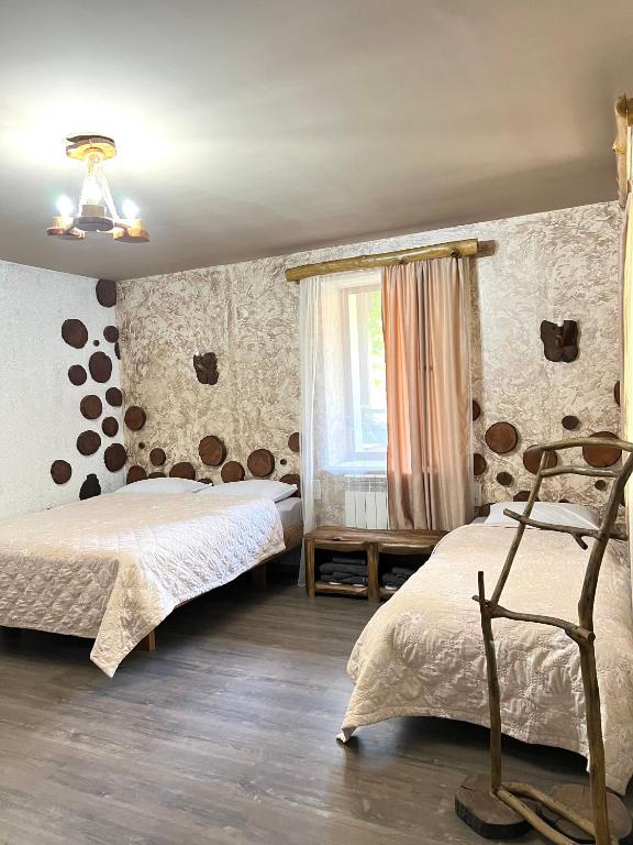 Postel nebo postele na pokoji v ubytování ARTSIV Guesthouse