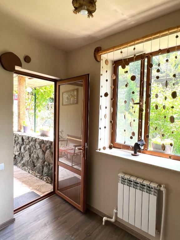 Postel nebo postele na pokoji v ubytování ARTSIV Guesthouse