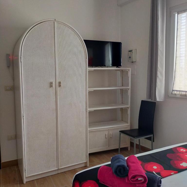 TV a/nebo společenská místnost v ubytování B&B Al Melograno