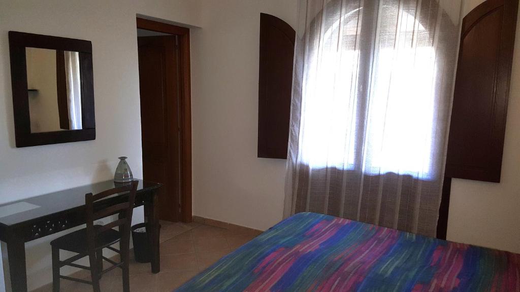 Postel nebo postele na pokoji v ubytování B&B Brezza di Mare (Sea Breeze)