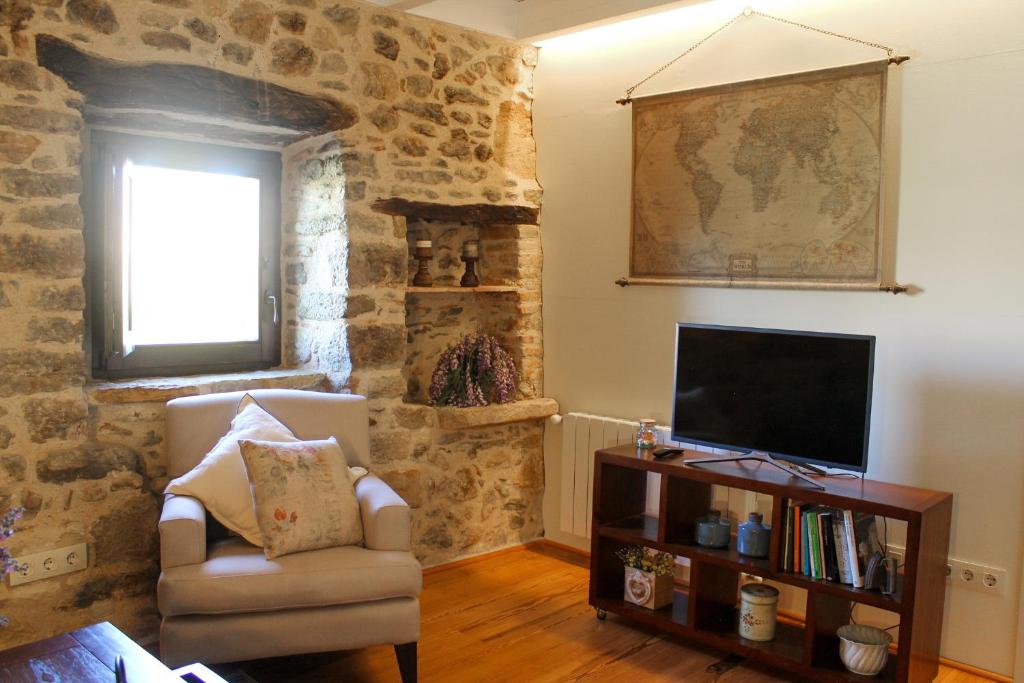 TV a/nebo společenská místnost v ubytování MONELLS - CASA Rural - CAN FELIP