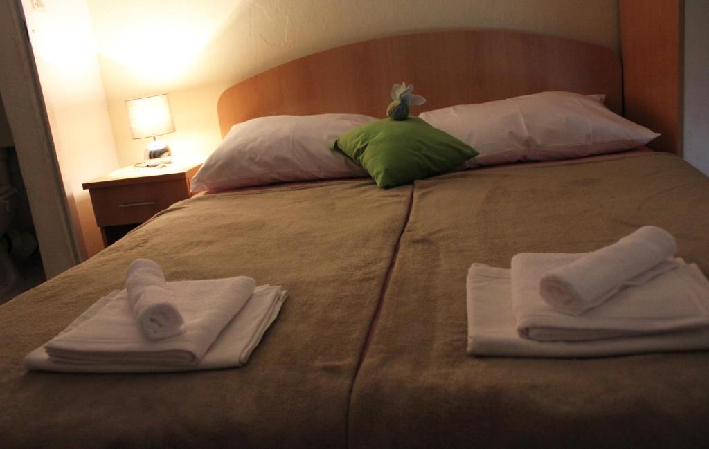 Posteľ alebo postele v izbe v ubytovaní Guesthouse Podaca