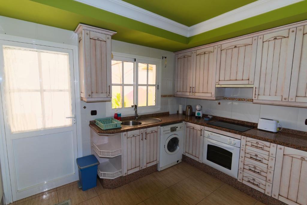 A kitchen or kitchenette at Casa Sagittarius Ocean view