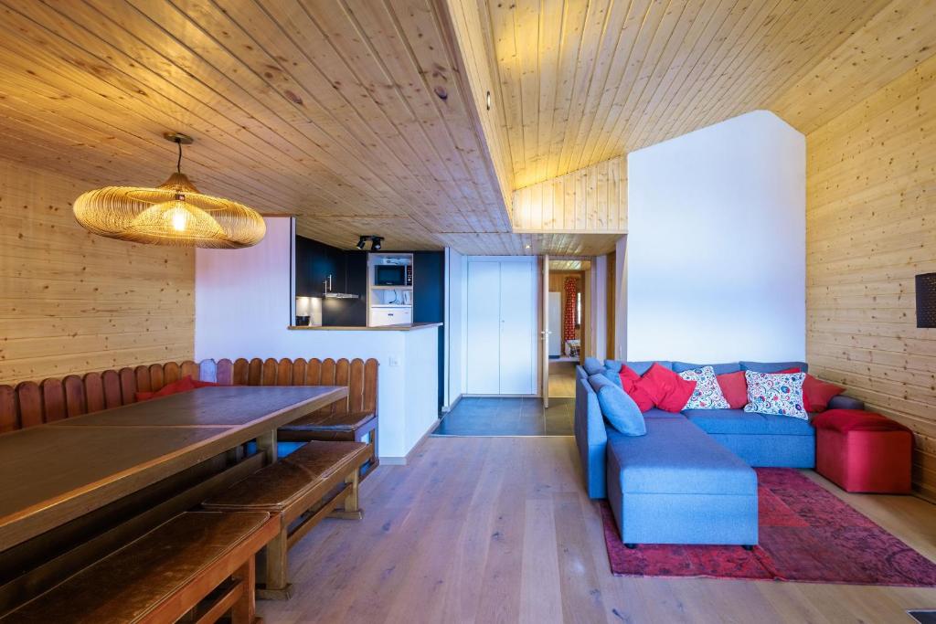 Posezení v ubytování Superbe appartement, en 2 parties, au centre d'Anzère