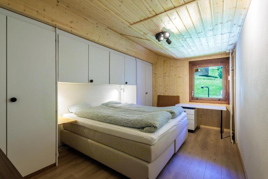 Postel nebo postele na pokoji v ubytování Superbe appartement, en 2 parties, au centre d'Anzère