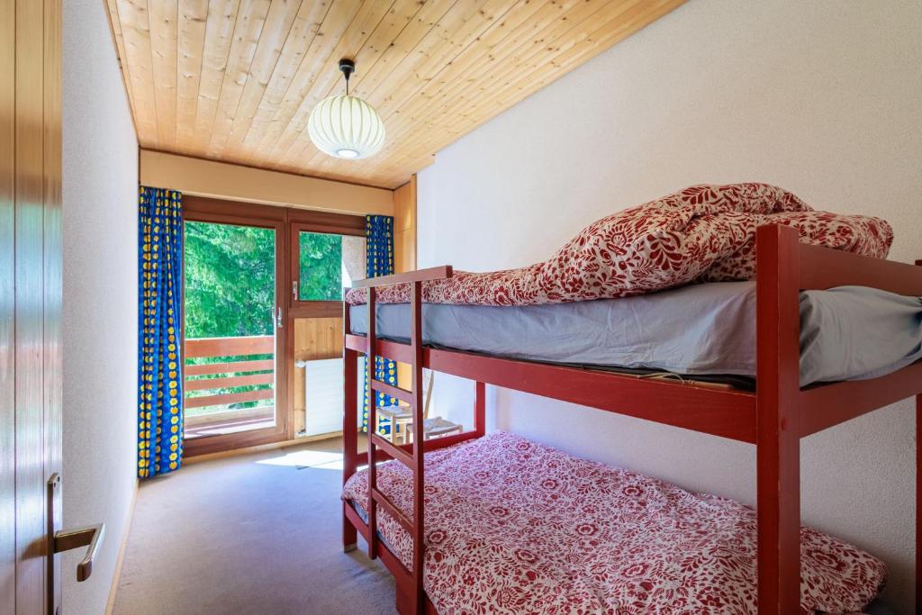 Postel nebo postele na pokoji v ubytování Superbe appartement, en 2 parties, au centre d'Anzère
