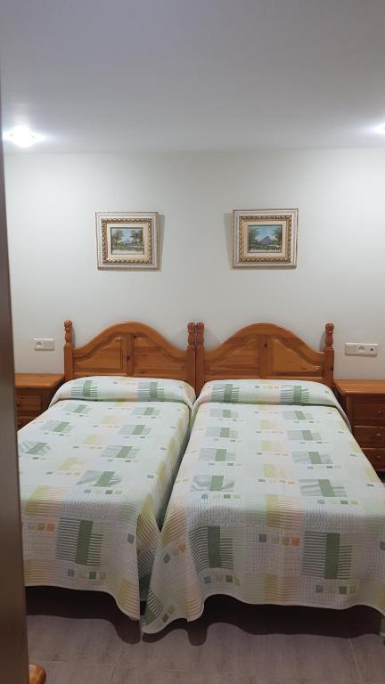 Postel nebo postele na pokoji v ubytování Casa Victoria