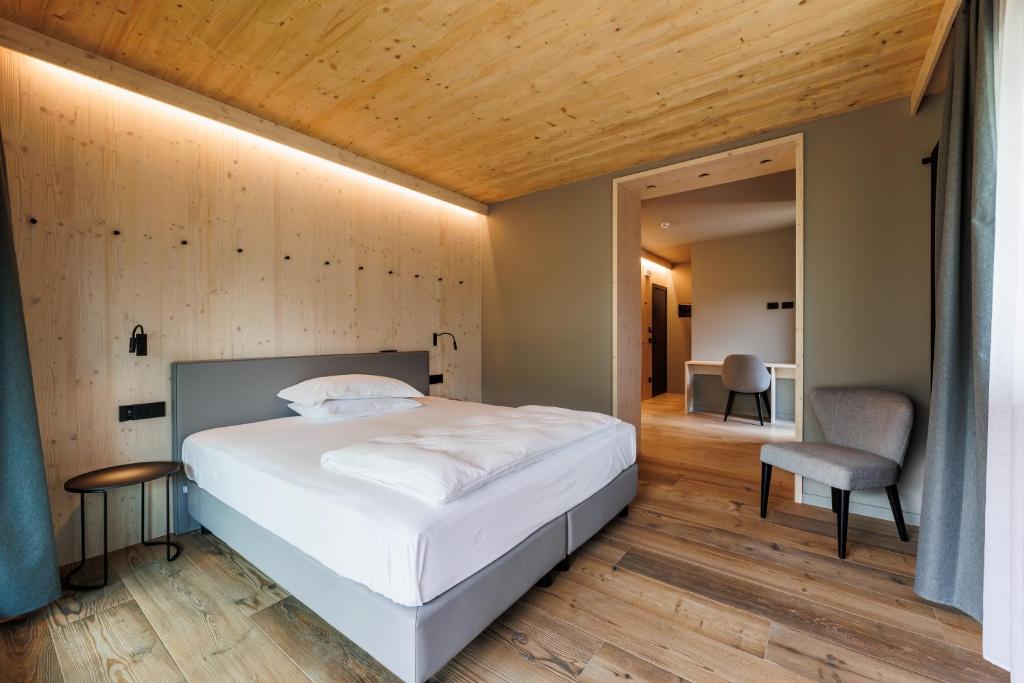 Postel nebo postele na pokoji v ubytování Hotel Miravalle
