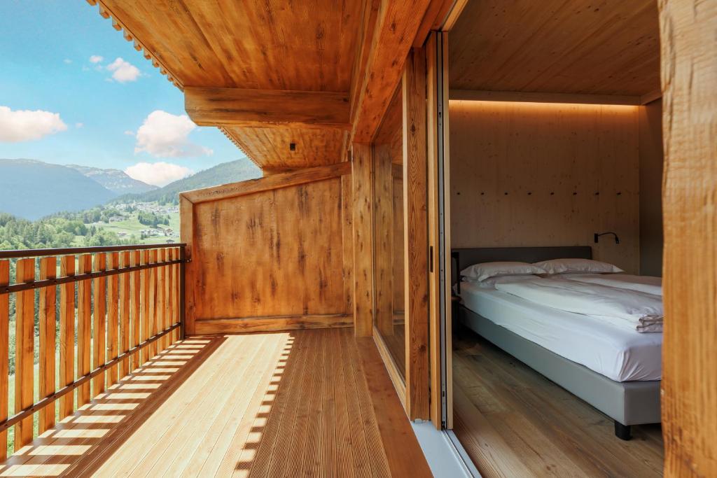 Postel nebo postele na pokoji v ubytování Hotel Miravalle