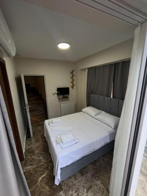 Postel nebo postele na pokoji v ubytování Ada Antik 2
