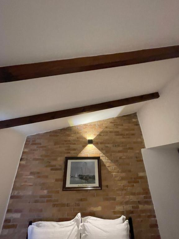 Postel nebo postele na pokoji v ubytování Hotel Kappa3 Villas