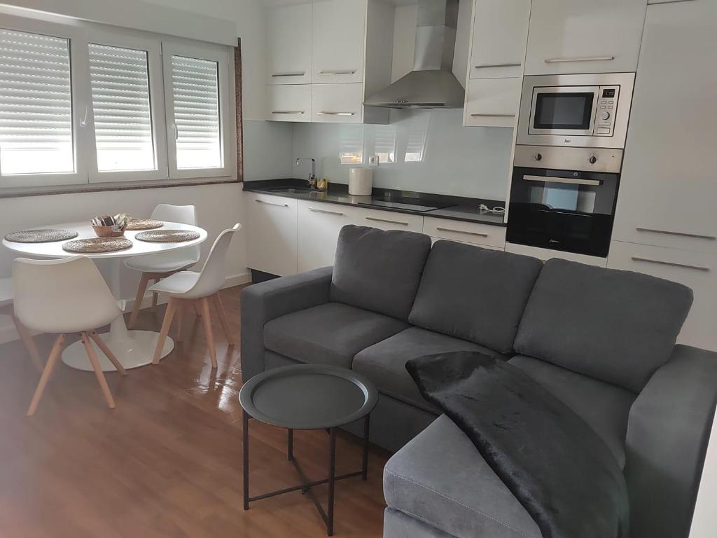 Kuchyňa alebo kuchynka v ubytovaní Apartamentos en Leis Muxia