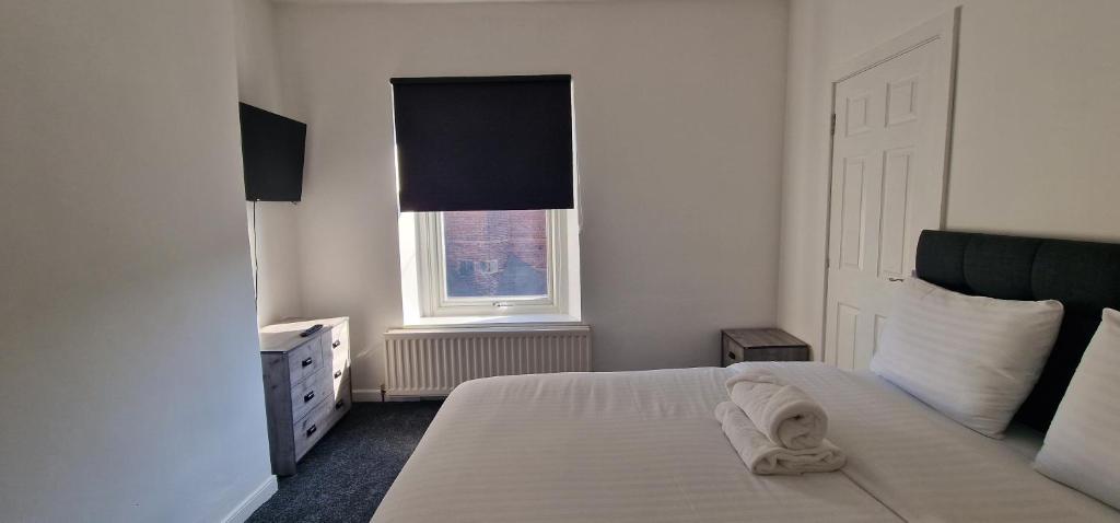 Postel nebo postele na pokoji v ubytování APARTMENT IN CENTRAL BARNSLEY