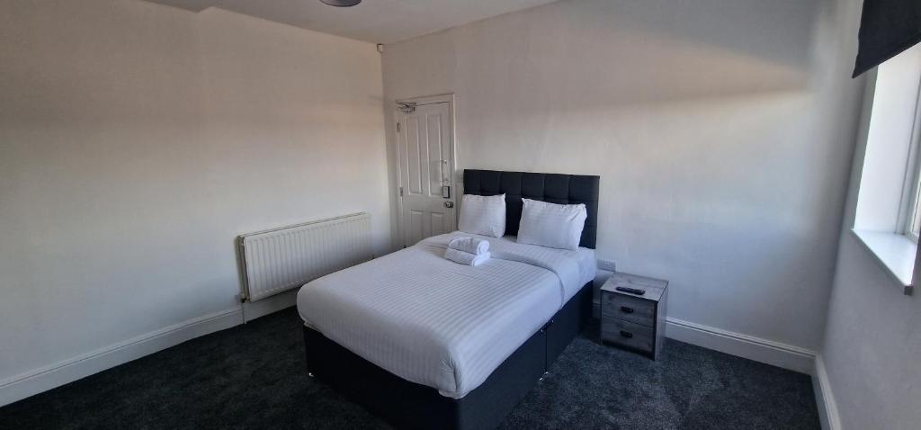 Postel nebo postele na pokoji v ubytování APARTMENT IN CENTRAL BARNSLEY