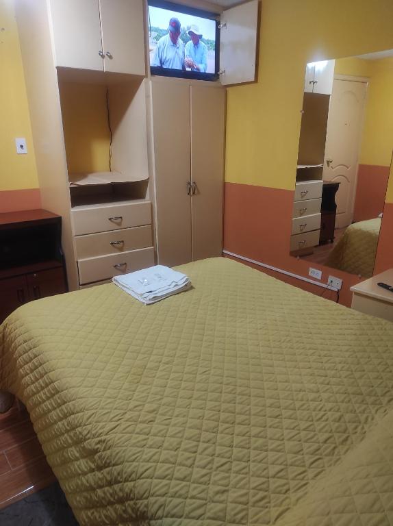 Postel nebo postele na pokoji v ubytování HOTEL CARIBEAN REAL