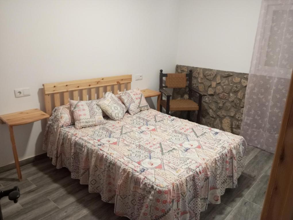 Ένα ή περισσότερα κρεβάτια σε δωμάτιο στο Casa rural valle de huebras