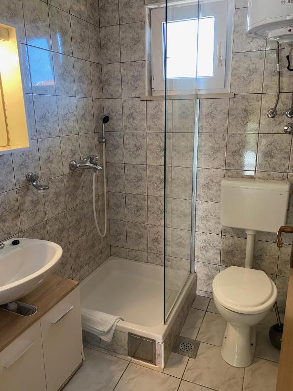 Kúpeľňa v ubytovaní Apartmani Dušanka