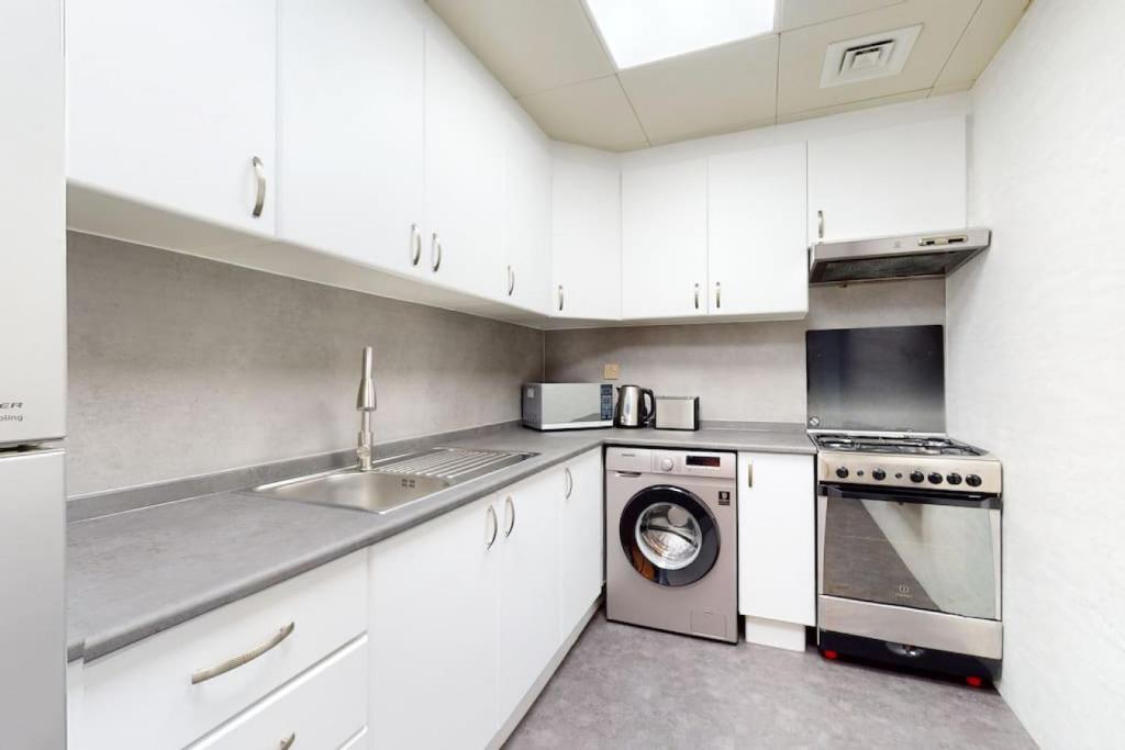 Kuchyň nebo kuchyňský kout v ubytování V3 Tower - Elegant One Bedroom