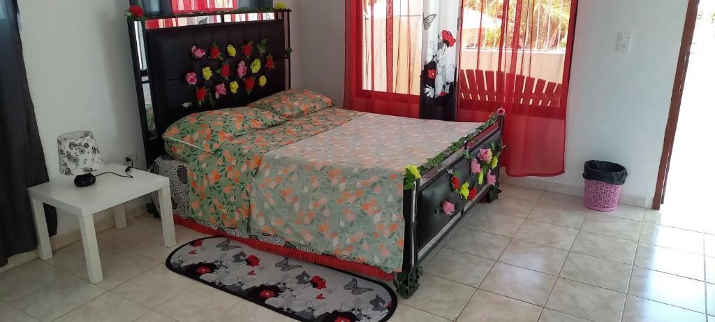 Postel nebo postele na pokoji v ubytování Casa MamaTinda